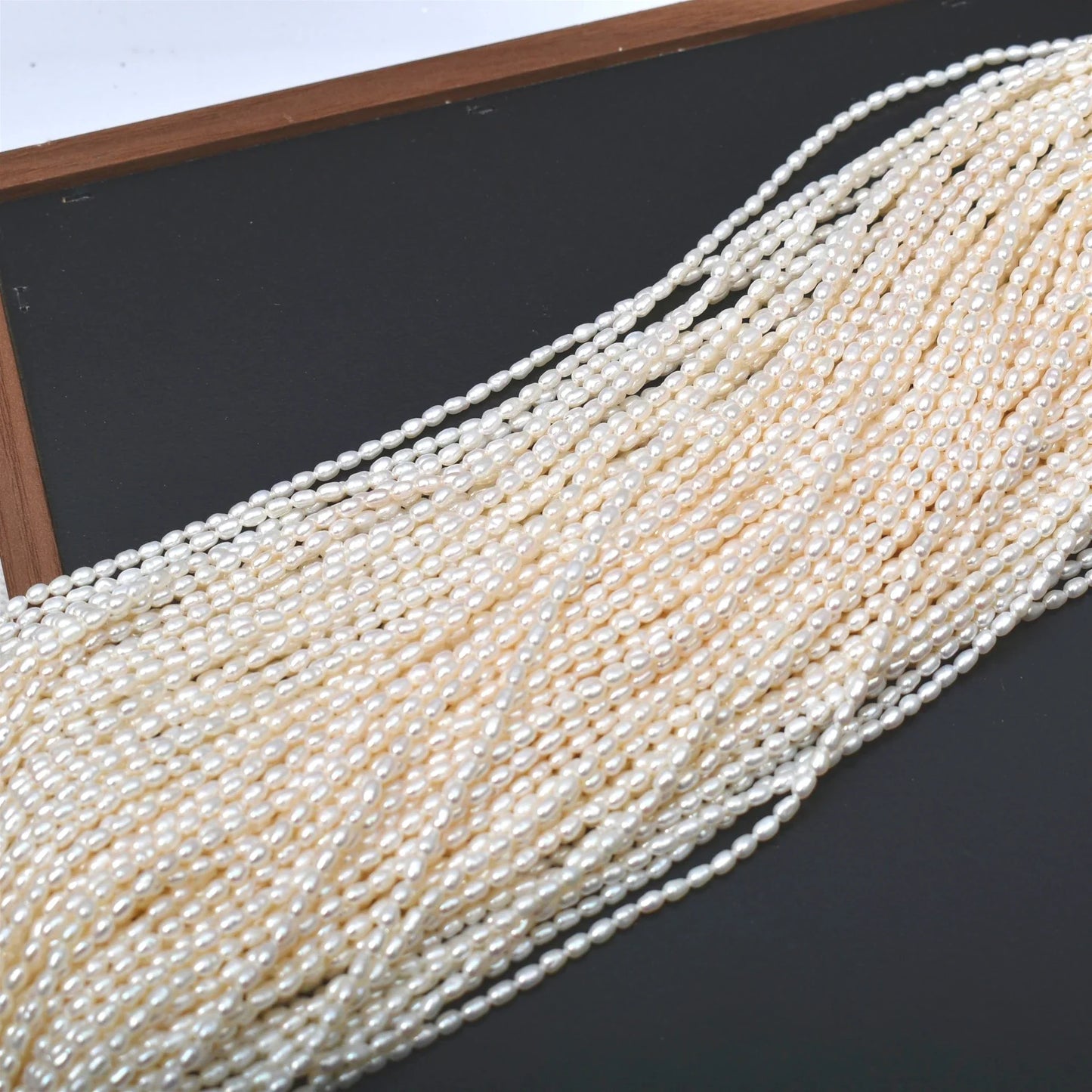 2.5-3mm Natural Radiant Freshwater White Rice AAAA Pearls Well-polished Smooth